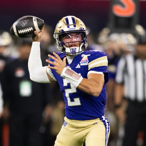 Washington quarterback Demond Williams Jr. (2) throws a pass during the LA Bowl NCAA college football game against Boise State Saturday, Dec. 13, 2025, in Inglewood, Calif. (AP Photo/Kyusung Gong)
