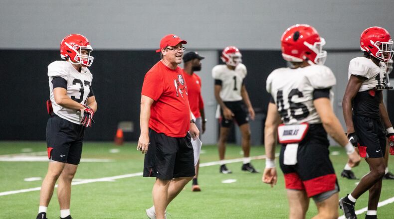 Georgia senior defensive analyst Will Muschamp directs special teams players inside the 'House of Payne' on Monday as the Bulldogs continue preseason preparations in Athens. (Photo by Tony Walsh/UGA Athletics)