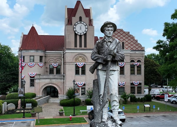 The Confederate memorial in Washington's town square was erected in 1908. (Hyosub Shin/AJC)