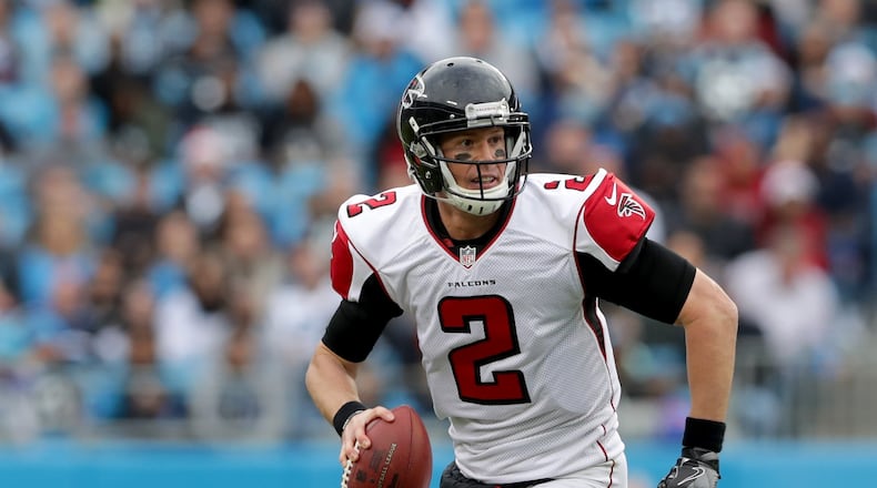 CHARLOTTE, NC - DECEMBER 24: Matt Ryan #2 of the Atlanta Falcons runs the ball against the Carolina Panthers in the 3rd quarter during their game at Bank of America Stadium on December 24, 2016 in Charlotte, North Carolina. (Photo by Streeter Lecka/Getty Images)