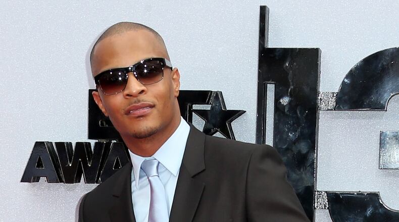 LOS ANGELES, CA - JUNE 30: Recording artist T.I. attends the 2013 BET Awards at Nokia Theatre L.A. Live on June 30, 2013 in Los Angeles, California. (Photo by Frederick M. Brown/Getty Images for BET) T.I., already connected with two VH1 reality shows, will partake in a documentary about the rise of hip hop in Atlanta. CREDIT: Getty