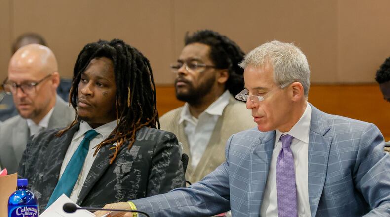 Atlanta rapper Young Thug, whose real name is Jeffery Williams, listens to Judge Peige Resse Withaker as his defense attorney, Brian Steel, goes through documents during a motion hearing at the Fulton County Courtroom on Tuesday, July 30, 2024.
(Miguel Martinez / AJC)