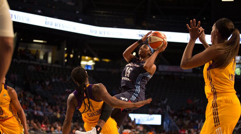 Tiffany Hayes of the Atlanta Dream puts up a shot in traffic. Photo by Mary Holt
