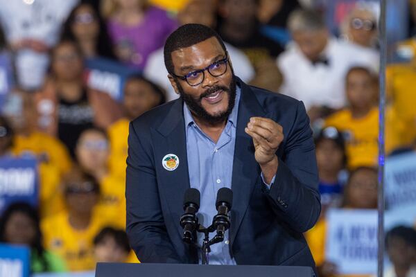 Director Tyler Perry speaks during Democratic presidential candidate Kamala Harris’ rally at James R. Hallford Stadium in Clarkston on Thursday, Oct. 24, 2024. (Arvin Temkar/AJC)