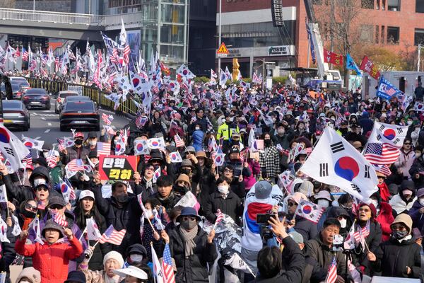 Supporters of impeached South Korean President Yoon Suk Yeol stage a rally to oppose his impeachment near the presidential residence in Seoul, South Korea, Friday, April 4, 2025. (AP Photo/Ahn Young-joon)