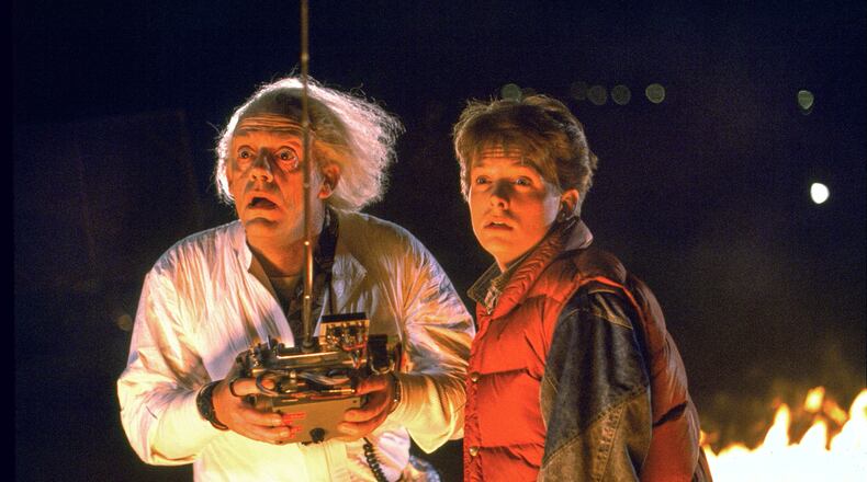 This image released by Universal Pictures shows Christopher Lloyd, left, and Michael J. Fox in a scene from the 1985 film "Back to the Future." (Universal Pictures via AP)
