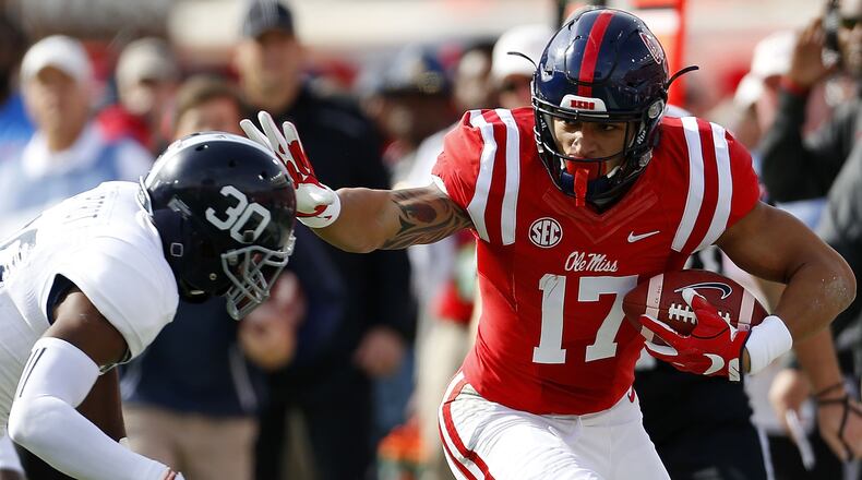 Evan Engram runs through a Georgia Southern defender last season.