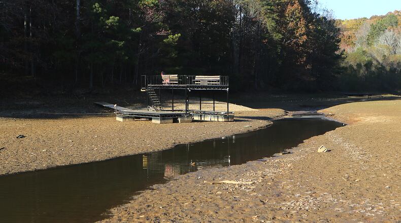 A boat dock sits on the bottom of a cove in Young Deer Creek at Lake Lanier from drought conditions on Nov. 17 near Cumming. Curtis Compton/ccompton@ajc.com