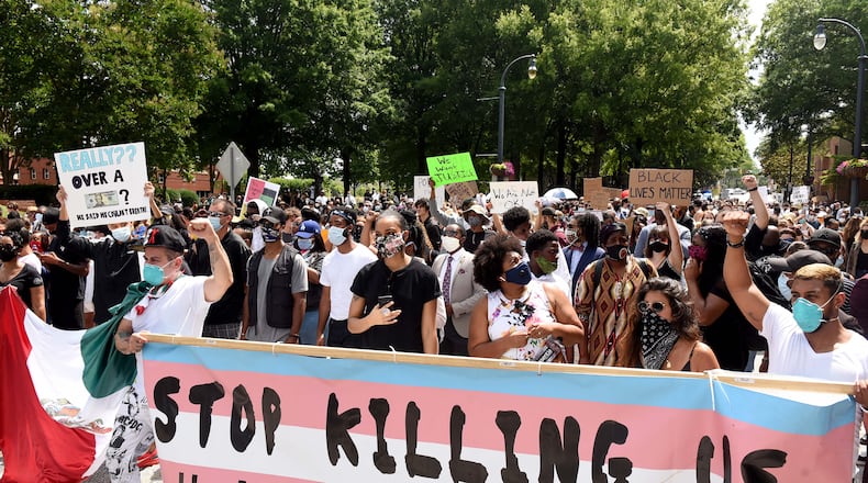 6/4/20 - Atlanta - Over 1,000 people gathered for an Atlanta Community March in honor of George Floyd's Funeral. It started at the Dr. Martin Luther King Jr. National Historical Park. The people were dressed in their âSunday bestâ as an "artistic and peaceful protest/march.â Ryon Horne/RHORNE@AJC.COM