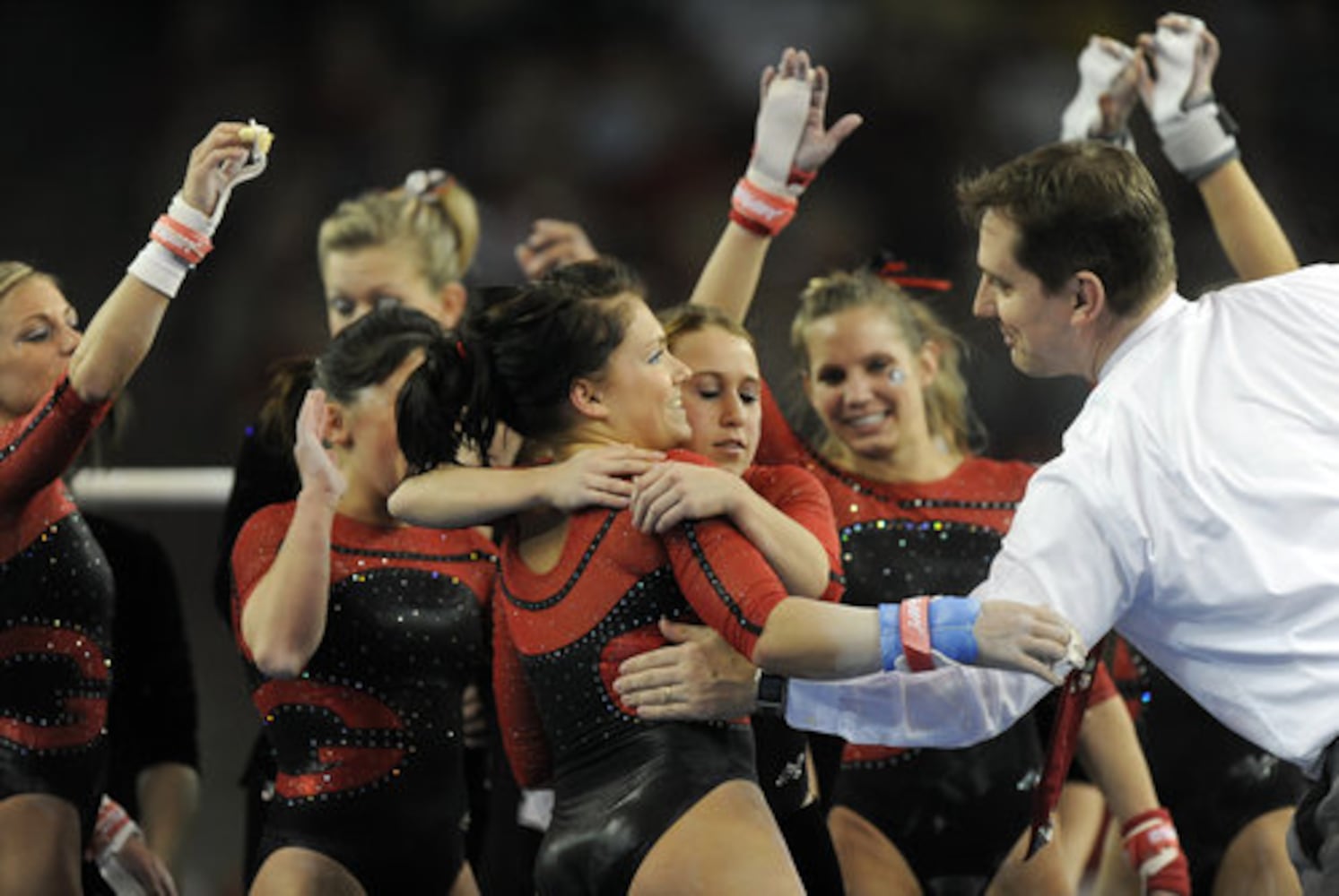 Gym Dogs win in coach's last home meet