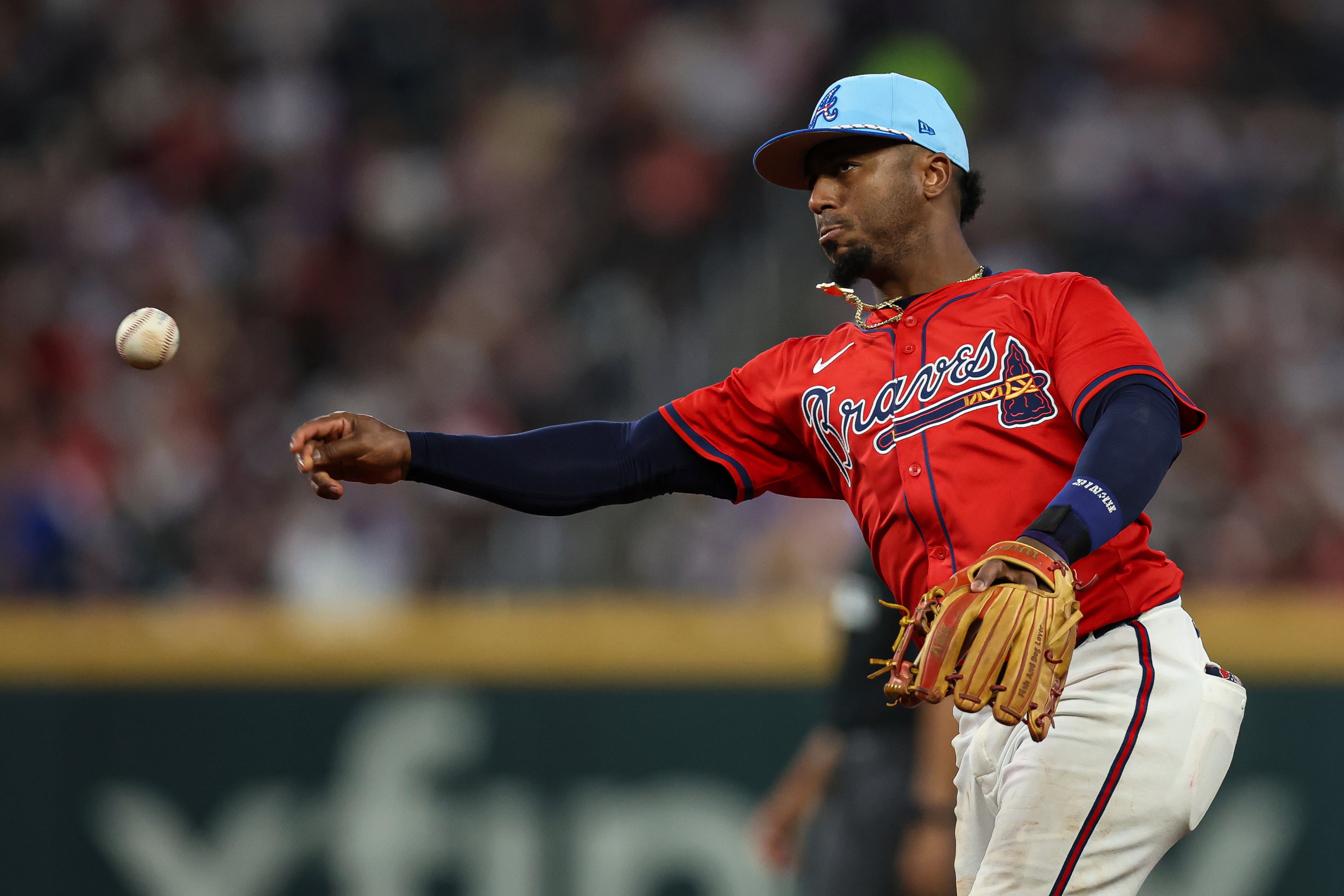 Braves second baseman Ozzie Albies throws to first base during the eighth inning of Friday's game against the Baltimore Orioles in Atlanta. (Colin Hubbard/AP)
