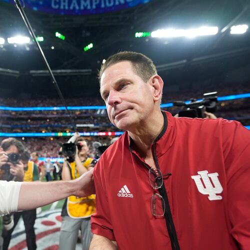 Oregon head coach Dan Lanning, left, greets Indiana head coach Curt Cignetti after the Peach Bowl NCAA college football playoff semifinal, Friday, Jan. 9, 2026, in Atlanta. (AP Photo/Brynn Anderson)