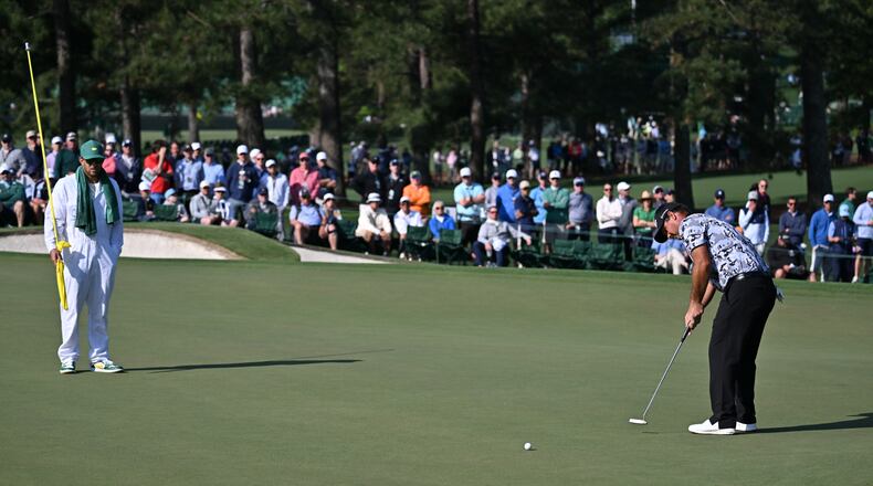 Patrick Reed putts on second green during first round of the Masters golf tournament, at Augusta National Golf Club, Thursday, April 10, 2025, in Augusta, Ga. (Hyosub Shin / AJC)