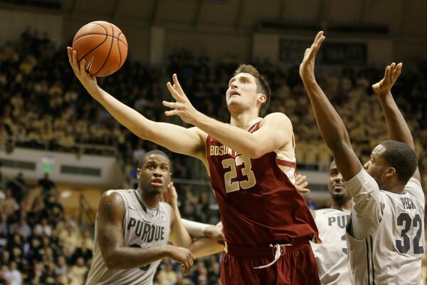 FILE - Boston College guard Alex Dragicevich shoots against Purdue in the first half of an NCAA college basketball game in West Lafayette, Ind., Wednesday, Dec. 4, 2013. (AP Photo/Michael Conroy, File)