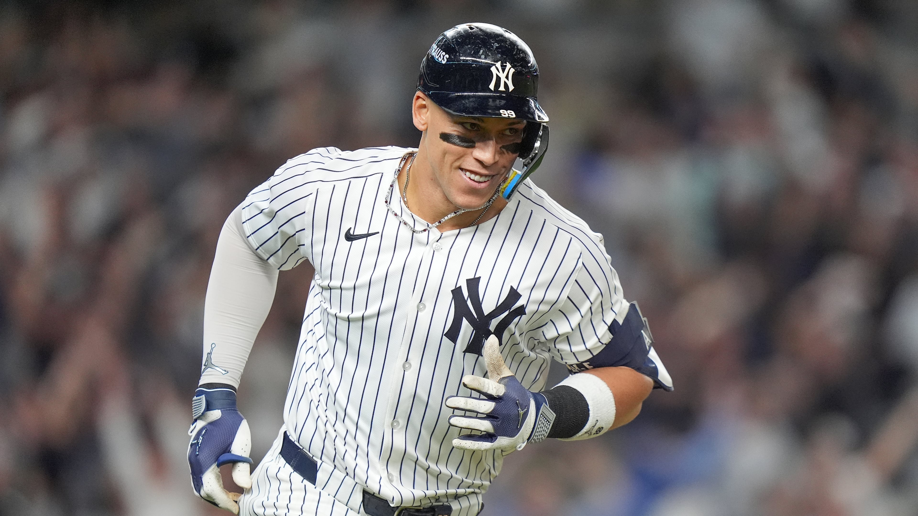 New York Yankees' Aaron Judge reacts as he rounds the bases after hitting a three-run home run against the Toronto Blue Jays during the fourth inning of Game 3 of baseball's American League Division Series, Tuesday, Oct. 7, 2025, in New York. (AP Photo/Frank Franklin II)