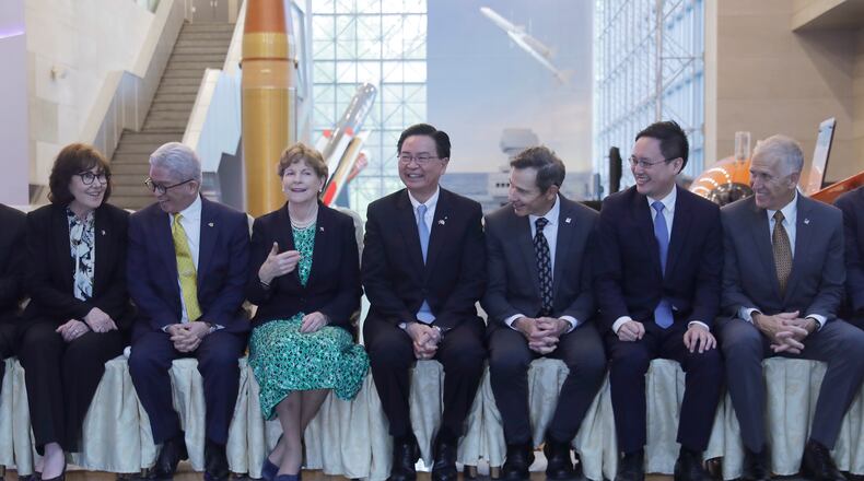 From left, US Sen. Jacky Rosen, Vice Mister of Taiwan National Defense Ministry Hsu Szu-chien, US Sen. Jeanne Shaheen, Secretary-General of the Taiwan National Security Council Joseph Wu, Sen. John Curtis, and US Sen. Thom Tillis, first from right, smile as they visiting the National Chung-Shan Institute of Science and Technology (NCSIST) in Taoyuan City, Northern Taiwan, Monday, March 30, 2026. (AP Photo/Chiang Ying-ying)