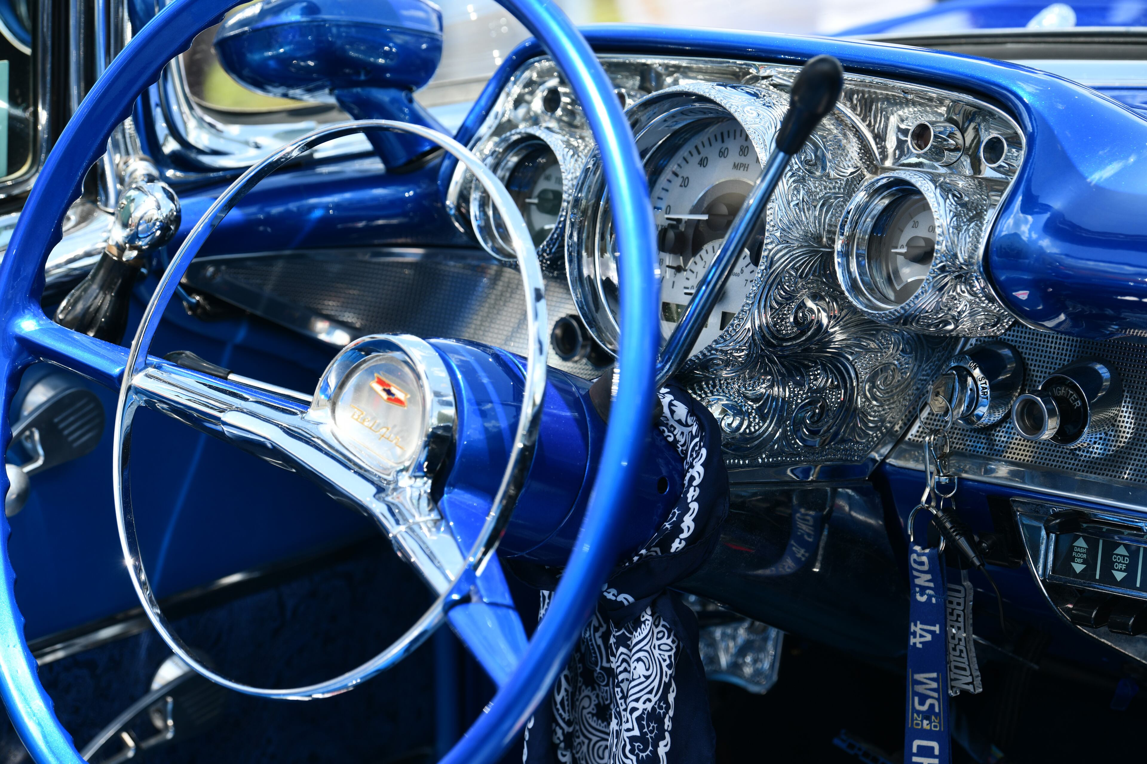 Custom blue 1957 Chevrolet Bel Air that Ice Cube drove onto the field at Dodger Stadium on Opening Day is displayed during the 4th Annual Rick Ross Car and Bike Show, Saturday, June 7, 2025, in Fayetteville. The 4th Annual Rick Ross Car and Bike Show will include a vendor market with more than 30 vendors, food trucks, fleets of classic/custom automobiles, luxury vehicles, boats, RVs and trailers on the front of the mansion. Stage performances include Plies, Ross' new signee Nino Breeze and Ross himself. (Hyosub Shin / AJC)