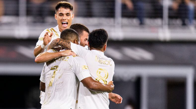 Atlanta United forward Josef Martinez (7) celebrates with teammates after scoring the first goal of the match against D.C. United Saturday, Aug. 21, 2021, at Audi Field in Washington. (Jacob Gonzalez/Atlanta United)
