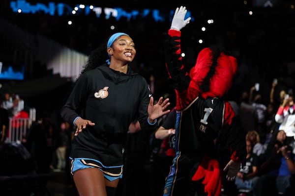 Atlanta Dream forward Angel Reese reacts during player intros before the start of a WNBA game against the Las Vegas Aces at State Farm Arena on Sunday, May 17, 2026, in Atlanta. (Colin Hubbard for the AJC)