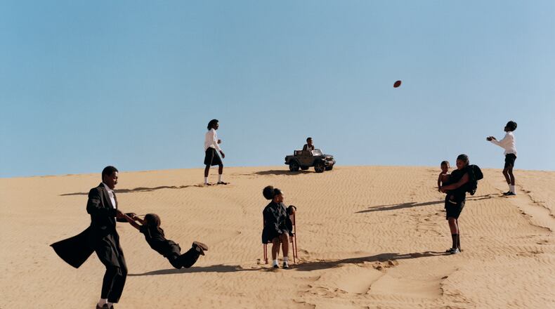 "Albany, Georgia" is one of photographs of Black families in nature in "Idyllic Space," an exhibition by Georgia-born Tyler Mitchell at the High Museum of Art.