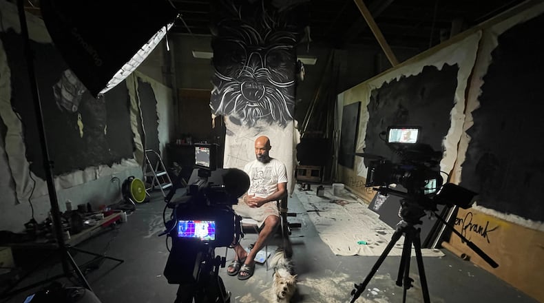 Behind the scenes for "Our Voices. Our Lives": Artist and muralist Kareem “Petie” Parker collects his thoughts for an interview at Guardian Studios on Atlanta’s Westside. Courtesy of W. Feagins Jr.