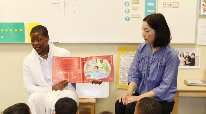 Principal Tara Ranzy (left) and Ms. Ai, a kindergarten teacher, go over a lesson in English and Japanese at the International Charter Academy in Peachtree Corners on Monday, March 11, 2019. The school, in its first year of operation, conducts classes in both languages. More than half of the time in class is spent with both the teacher and the students speaking Japanese. EMILY HANEY / emily.haney@ajc.com