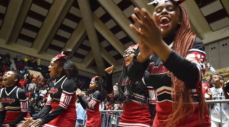 Tri-Cities cheerleader members cheer in GHSA State Basketball Championship game at the Macon Centreplex in Macon on Saturday, March 9, 2019. Tri-Cities won 46-43 over the Tucker. HYOSUB SHIN / HSHIN@AJC.COM
