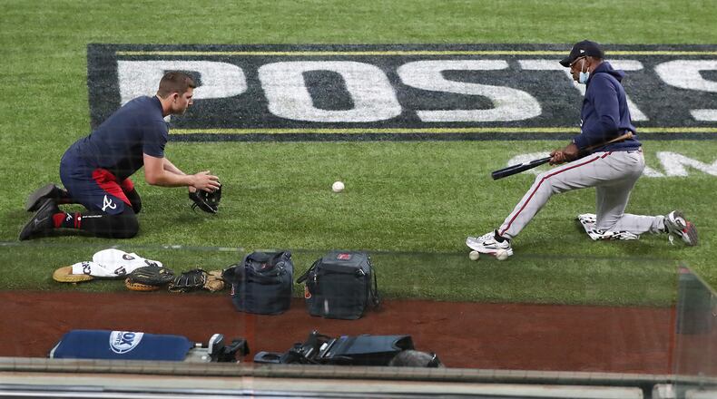 Braves third baseman Austin Riley runs through his drills with Ron Washington in advance of last season's NLCS vs. the Los Angeles Dodgers. (Curtis Compton/Atlanta Journal-Constitution/TNS)