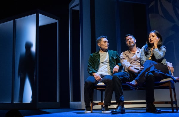 This image released by Polk & Co. shows Daniel Dae Kim, from left, and Ryan Eggold, and Shannon Tyo during a performance of "Yellow Face on Broadway," a play by David Henry Hwang, in New York. (Joan Marcus/Polk & Co. via AP)