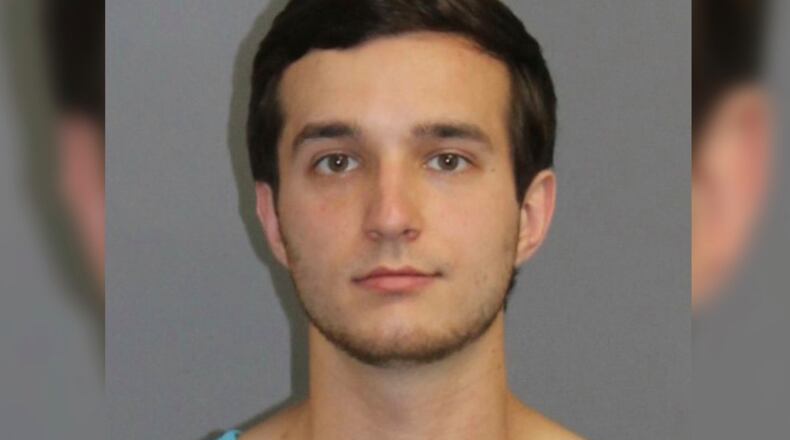 Alexander Hassinger, 24, was arrested at his Newtown, Connecticut, home Wednesday evening after police say he tweeted threats to harm police and others in Valdosta following a video showing a use-of-force incident with Valdosta police.