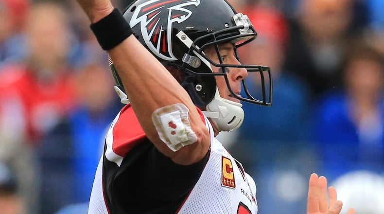 102515 NASHVILLE: -- Falcons quarterback Matt Ryan, who says he is not playing hurt and his body is in good shape, passes against the Titans with a bandaged elbow in a football game on Sunday, Oct. 25, 2015, in Nashville. Curtis Compton / ccompton@ajc.com