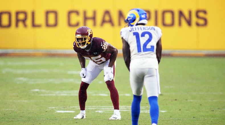 Los Angeles Rams wide receiver Van Jefferson (12) lines up against Washington Football Team cornerback Fabian Moreau (25) during an NFL football game against the Los Angeles Rams, Sunday, Oct. 11, 2020 in Landover, Md. (AP Photo/Daniel Kucin Jr.)