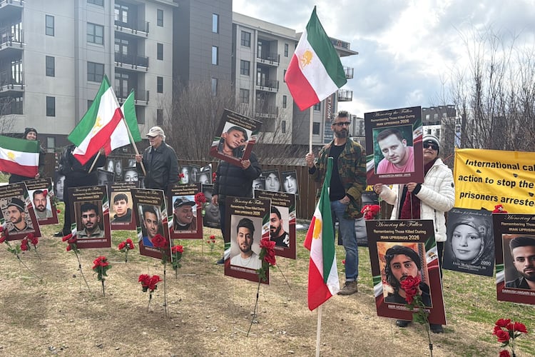 This photo, taken on Atlanta's Beltline by Shohreh Mirfendereski of the Iranian American Community of Georgia, shows the organization's weekly photo display of martyrs. (Courtesy)