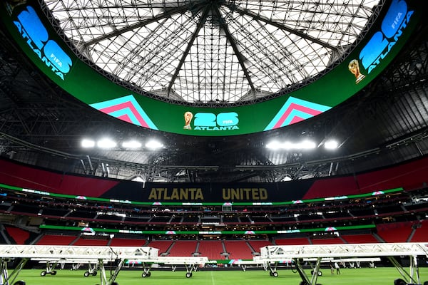 The Mercedes-Benz Stadium 360-degree HD displays "FIFA World Cup 26" during a media briefing Thursday, featuring Atlanta leaders across various elements of the events.