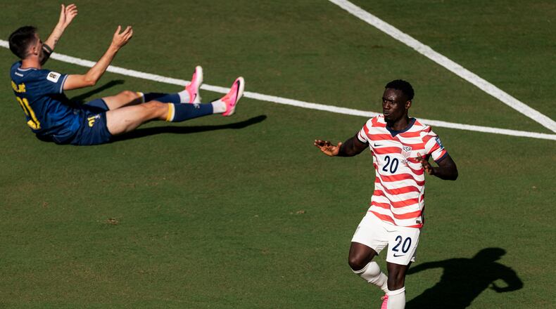 United States forward Folarin Balogun (20) gestures after scoring a goal during the first half of the World Cup 2026 Round of 32 Football match between United States and Bosnia and Herzegovina in Santa Clara, Calif., Wednesday, July 1, 2026. (Stephen Lam/San Francisco Chronicle via AP)