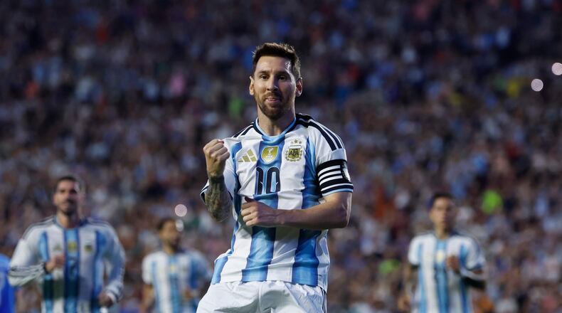 Argentina forward Lionel Messi (10) reacts after scoring on a free kick during the second half of an international friendly match against Iceland, Tuesday, June 9, 2026, in Auburn, Ala. (AP Photo/Butch Dill)