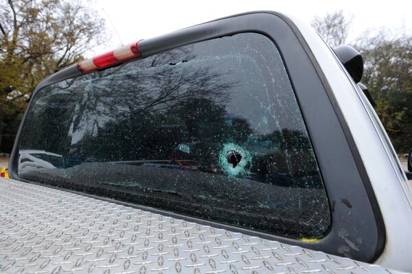 A photo of the shattered rear window of Charleston Burnett III's grandfather's pickup truck the day after it was struck by gunfire the night of Nov. 21, 2013. (Courtesy of The Macon Telegraph)
