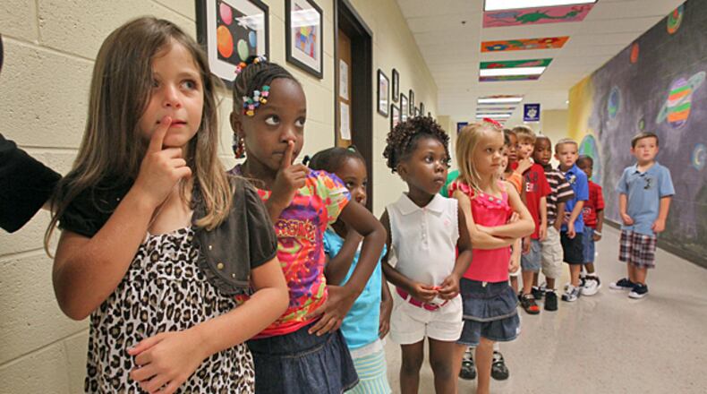 A guest columnist advocates for open enrollment, which allows K-12 students to transfer from one public school to another. While such policies exist in Georgia, they are often unclear to families. (John Spink / AJC file photo)