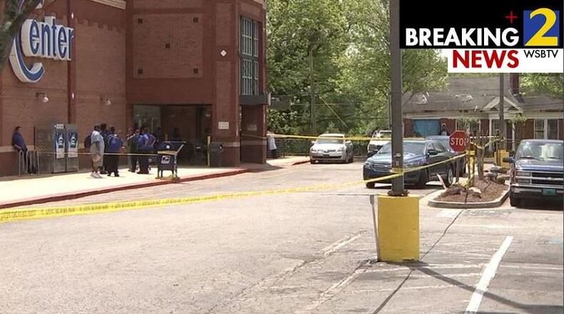 A woman was shot inside a southwest Atlanta Kroger following a dispute with another woman and a man, police said.