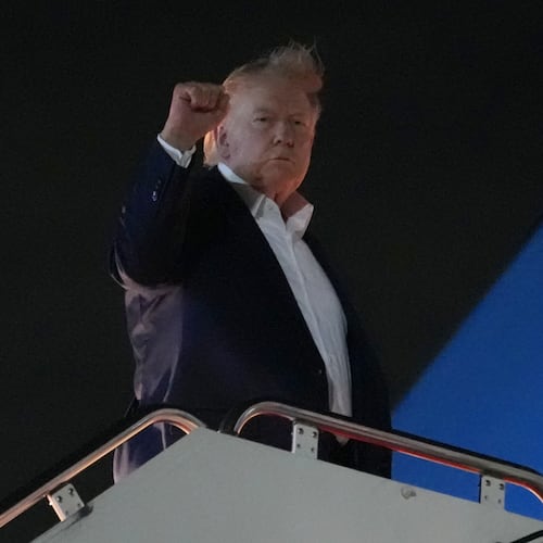 President Donald Trump gestures as he boards Air Force One, Monday, June 15, 2026, at Joint Base Andrews, Md. (AP Photo/Julia Demaree Nikhinson)