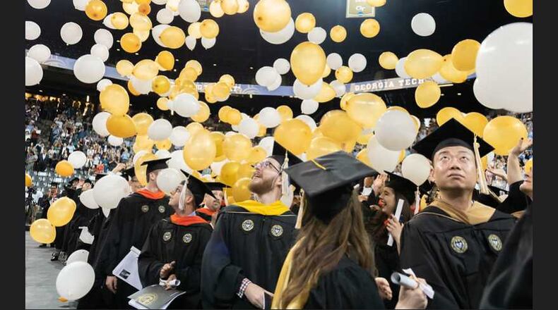 Georgia Tech students watch as balloons fall during its 2019 commencement ceremony. PHOTO CONTRIBUTED.
