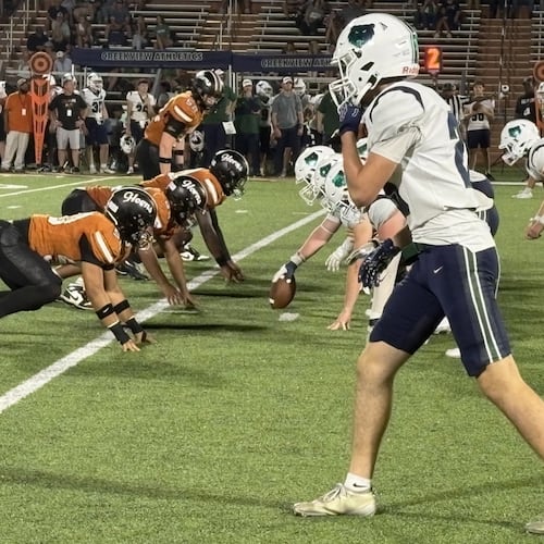 Kell's defense digs in for a play in the fourth quarter of the Longhorns' 41-21 victory over Creekview on Sept. 18, 2026, in Marietta.