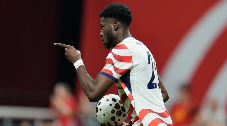 United States' Patrick Agyemang (25) celebrates his goal against Belgium during the second half of an international friendly soccer match, Saturday, March 28, 2026, in Atlanta. (AP Photo/Mike Stewart)
