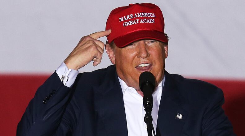 BOCA RATON, FL - MARCH 13: Republican presidential candidate Donald Trump speaks during his campaign rally at the Sunset Cove Amphitheater on March 13, 2016 in Boca Raton, Florida. Mr. Trump continues to campaign before the March 15th Florida primary. (Photo by Joe Raedle/Getty Images)