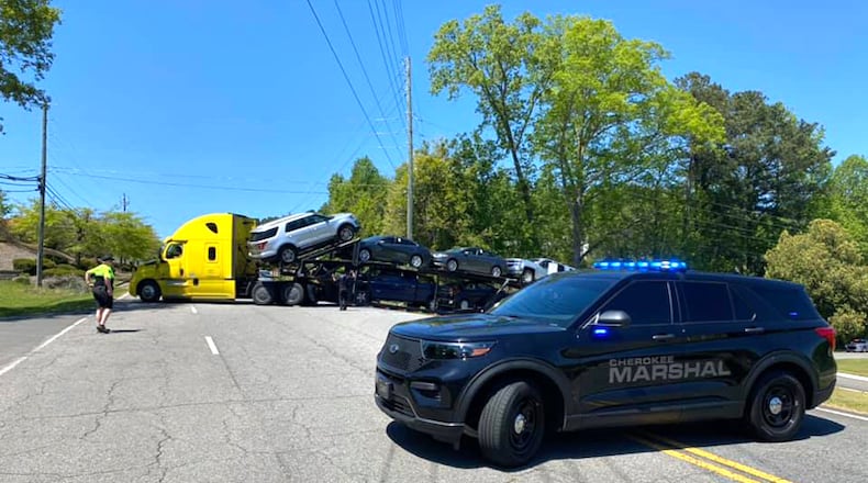 The Cherokee County Marshal's Office works an accident scene. The agency recently was reaccredited by the Commission on Accreditation for Law Enforcement Agencies (CALEA) .