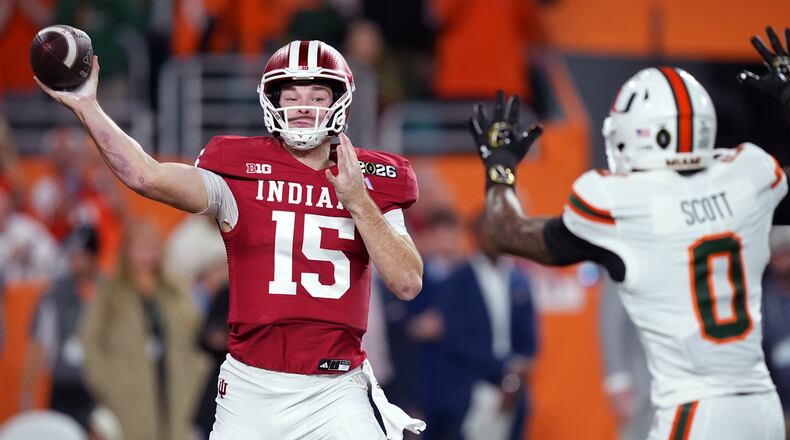 FILE - Indiana quarterback Fernando Mendoza passes against Miami during the first half of the College Football Playoff national championship game, Jan. 19, 2026, in Miami Gardens, Fla. (AP Photo/Rebecca Blackwell, File)