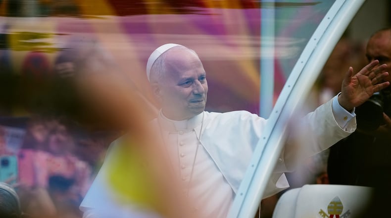 Pope Leo XIV waves as he arrives to celebrate Mass at the Basilica of the Sagrada Familia in Barcelona, Spain, Wednesday, June 10, 2026. (AP Photo/Joan Mateu Parra)