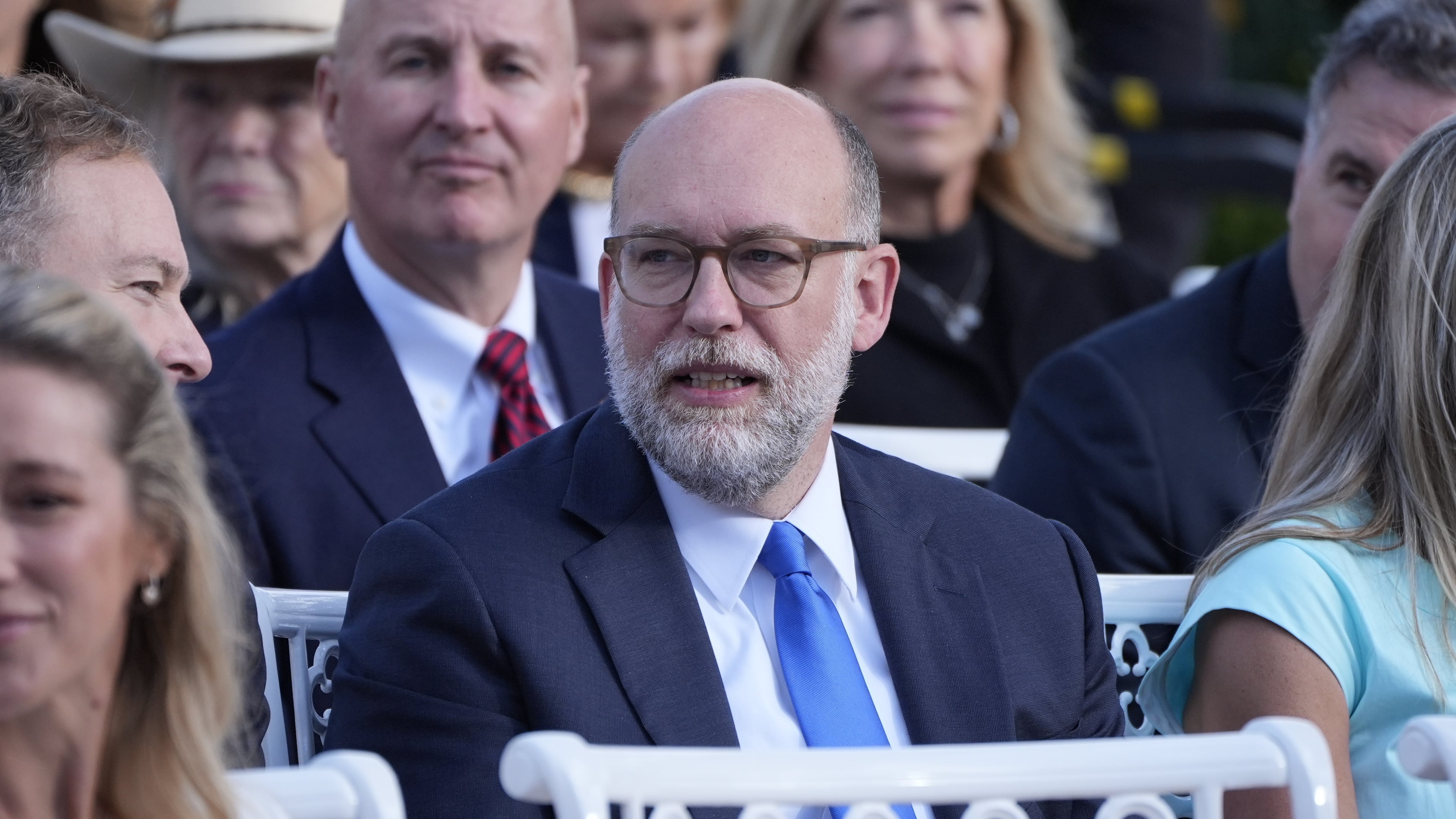 Russell Vought, Director of the Office of Management and Budget, attends a ceremony where President Donald Trump will present the Presidential Medal of Freedom for Charlie Kirk to his widow Erika Kirk in the Rose Garden of the White House, Tuesday, Oct. 14, 2025, in Washington. (AP Photo/Mark Schiefelbein)