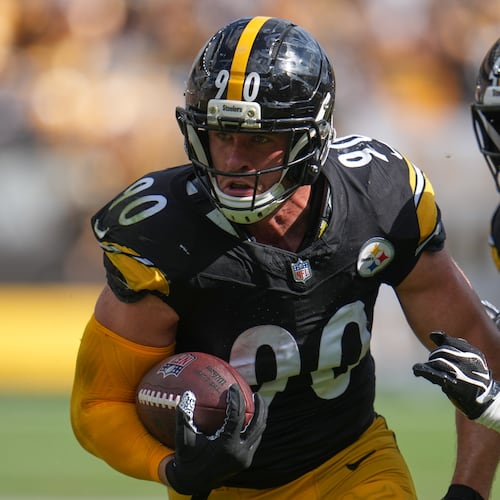 Pittsburgh Steelers outside linebacker T.J. Watt (90) returns an interception in for a touchdown during an NFL football game, Sunday, Sept. 13, 2026, in Pittsburgh. (AP Photo/Gene J. Puskar)