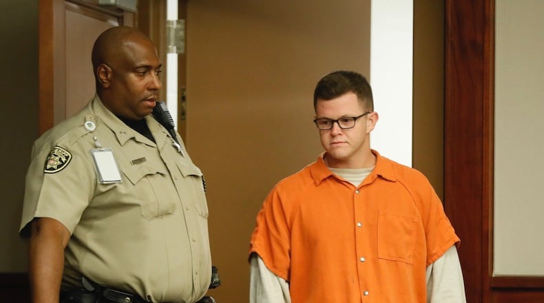 Garrett Kyle Anderson is led into a Cobb County courtroom Tuesday afternoon.